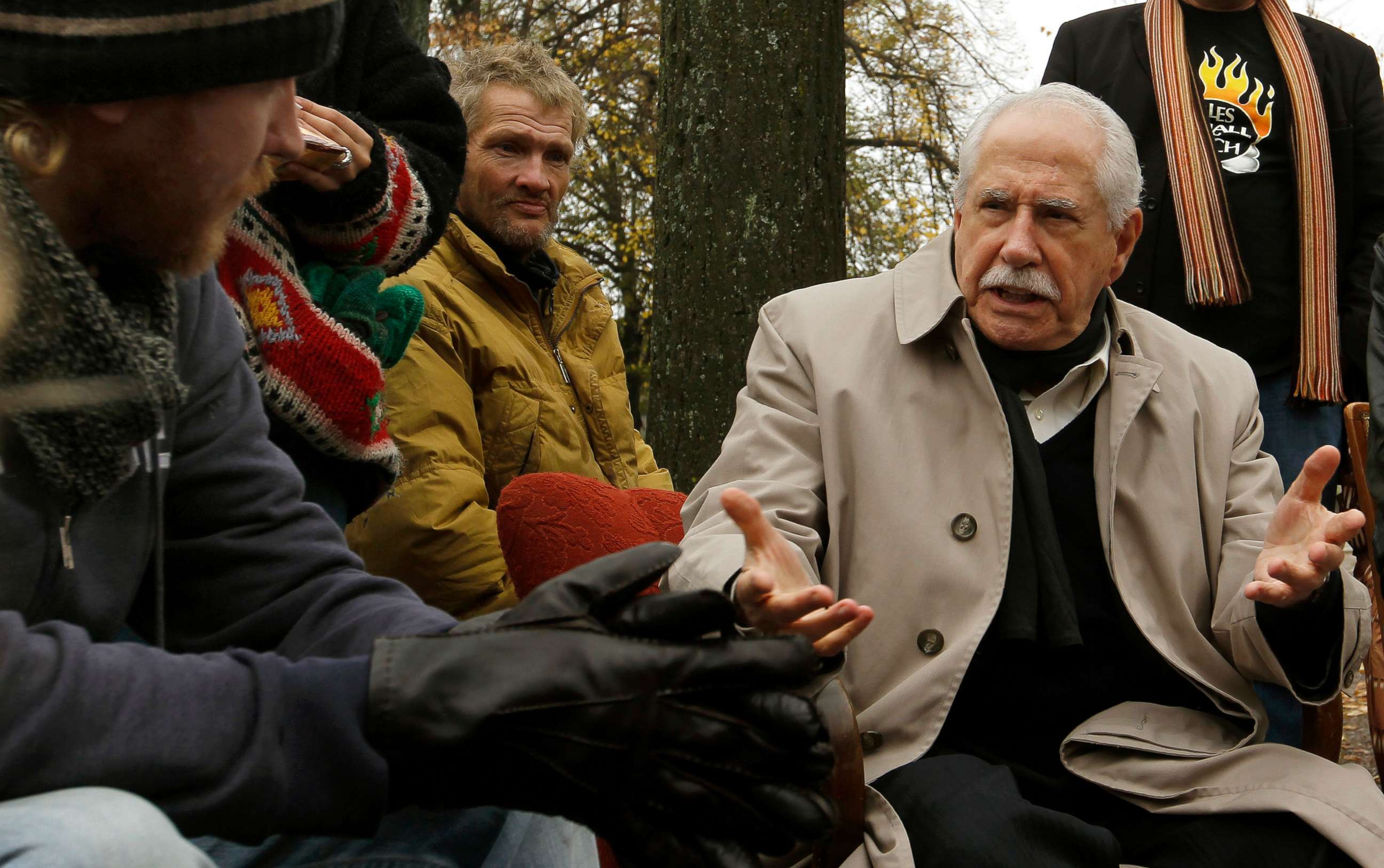 PHOTO: Former U.S. senator Mike Gravel talks to demonstrators at their camp at the Lindenplatz square in Zurich, Oct. 31, 2011.
