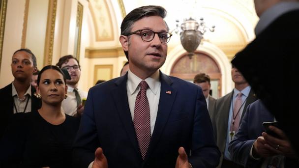 Speaker Mike Johnson speaks to reporters as he leaves the House Chamber at the U.S. Capitol, May 15, 2025 in Washington.