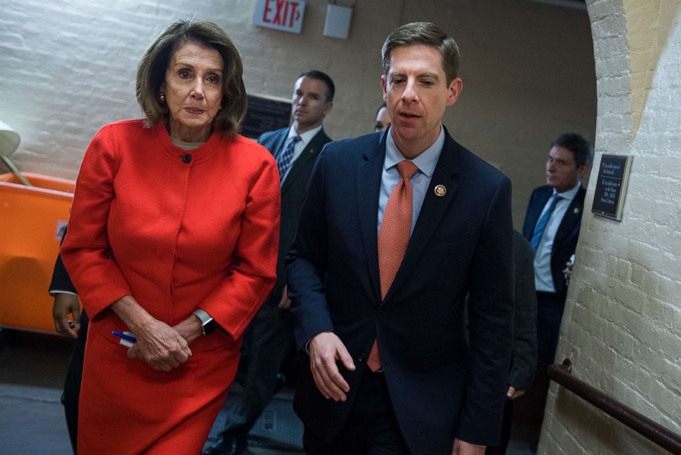 PHOTO: Rep. Mike Levin, right, and Speaker Nancy Pelosi leave a meeting of the House Democratic Caucus in the Capitol on Jan. 30, 2019.