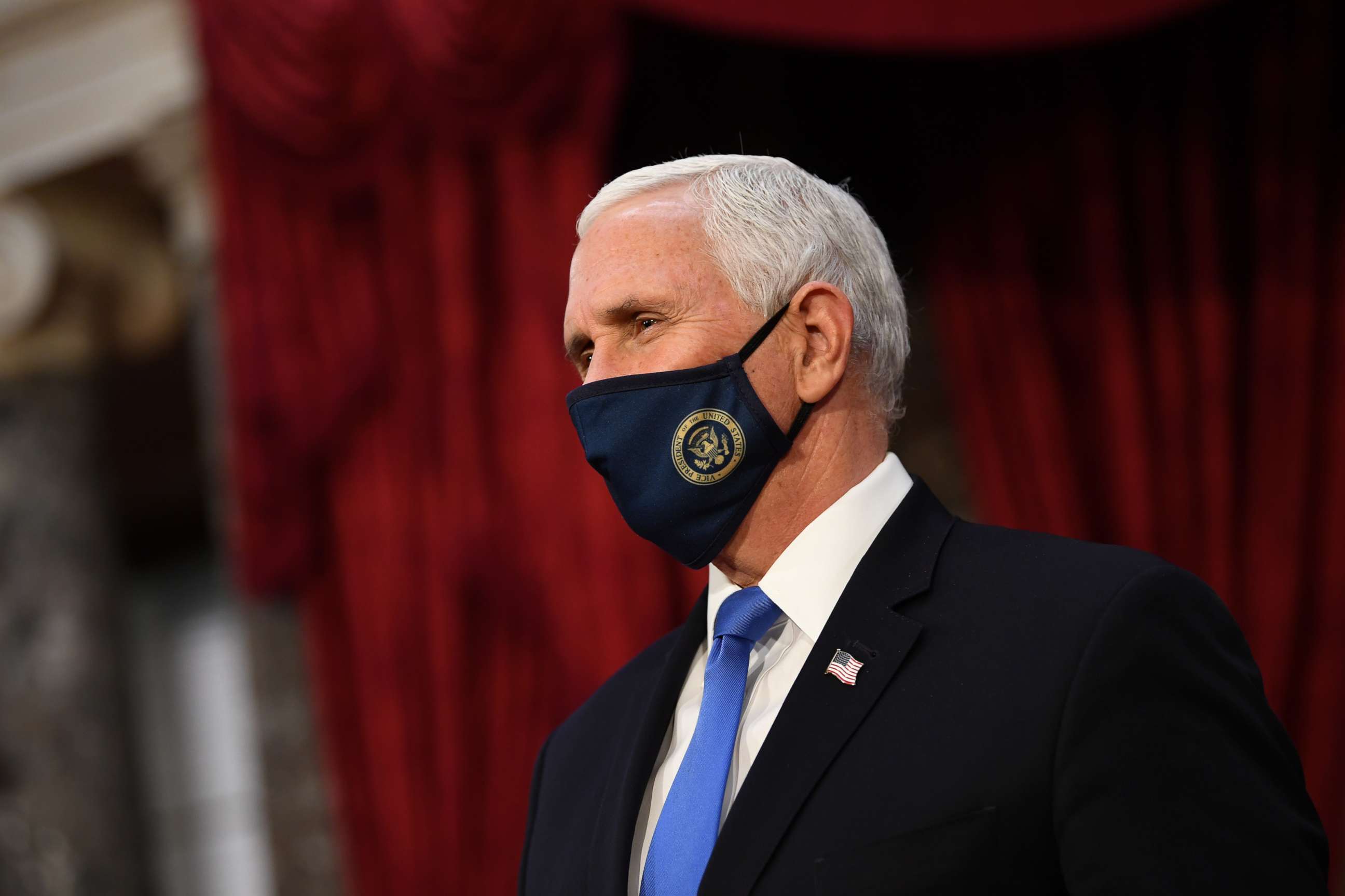 PHOTO: Vice President Mike Pence wears a face mask as he waits to participate in mock swearing-in ceremonies for Senators in the Old Senate Chambers at the U.S. Capitol Building, Jan. 3, 2021, in Washington.