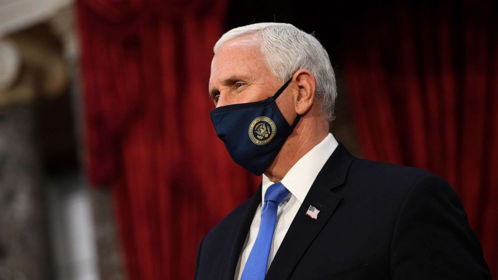 PHOTO: Vice President Mike Pence wears a face mask as he waits to participate in mock swearing-in ceremonies for Senators in the Old Senate Chambers at the U.S. Capitol Building, Jan. 3, 2021, in Washington.