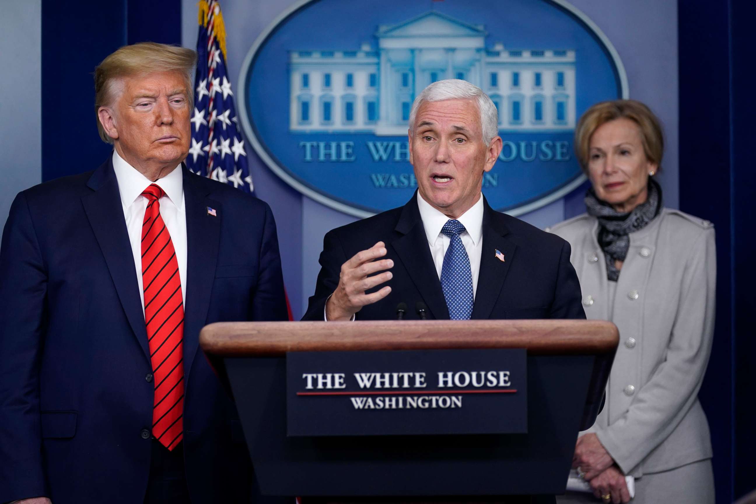 PHOTO: Vice President Mike Pence, center, speaks as President Donald Trump and White House coronavirus response coordinator Dr. Deborah Birx listen during press briefing with the coronavirus task force, at the White House, March 19, 2020, in Washington.