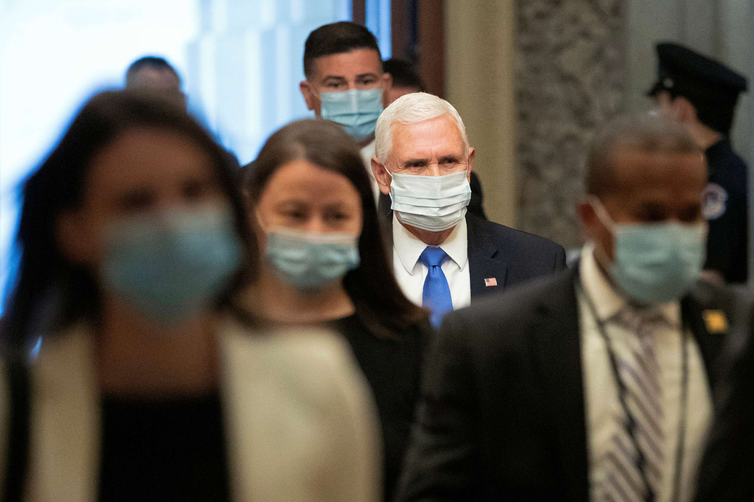 PHOTO: Vice President Mike Pence wears a face mask to protect against the spread of the new coronavirus as he arrives on Capitol Hill in Washington, May 19, 2020.