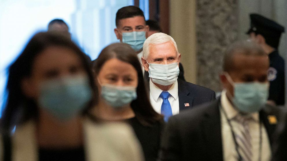 PHOTO: Vice President Mike Pence wears a face mask to protect against the spread of the new coronavirus as he arrives on Capitol Hill in Washington, May 19, 2020.