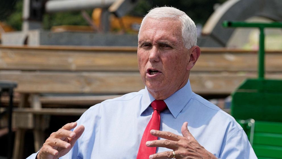 PHOTO: Republican presidential candidate and former Vice President Mike Pence speaks with the media during a stop at the Indiana State Fair, Aug. 2, 2023, in Indianapolis.