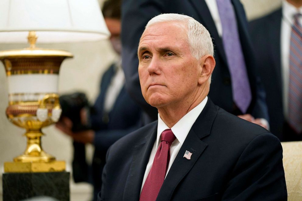 PHOTO: Vice President Mike Pence listens to a reporter's question during a meeting with President Donald Trump and Iraqi Prime Minister Mustafa al-Kadhimi in the Oval Office of the White House, Aug. 20, 2020, in Washington.