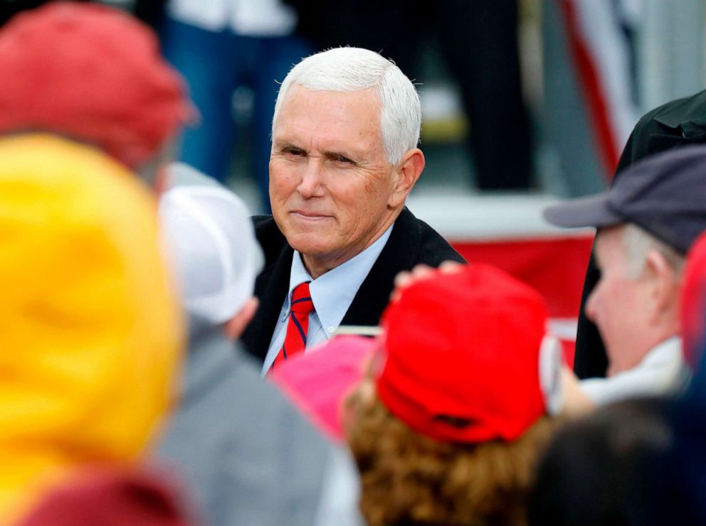 PHOTO: Vice President Mike Pence greets supporters after his "Make America Great Again!" campaign event at Oakland County International Airport in Waterford, Oct. 22, 2020.