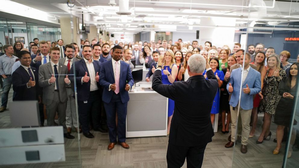 PHOTO: Vice President Mike Pence speaks to staffers at a campaign office for him and President Donald Trump, on June 10, 2020.