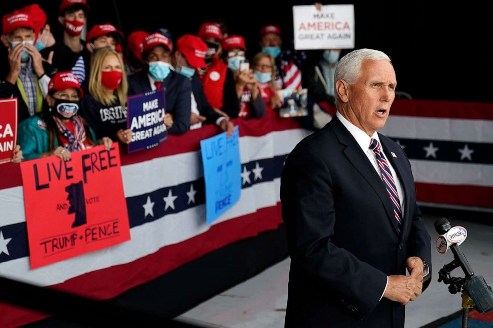 PHOTO: Vice President Mike Pence gives a television interview after a campaign rally, Tuesday, Sept. 22, 2020, at Lanconia Municipal Airport in Gilford, N.H.