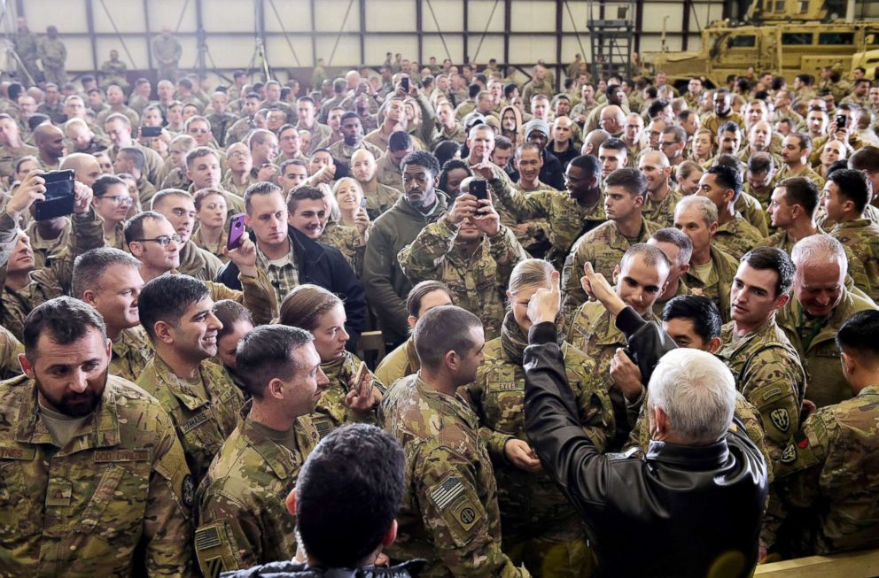 PHOTO: Vice President Mike Pence greets troops in a hangar at Bagram Air Field in Afghanistan, Dec. 21, 2017. 