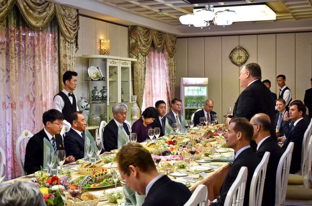 PHOTO: Secretary of State Mike Pompeo, right, stands as he speaks during a dinner between North Korean dignitaries and U.S. diplomats in Pyonyang, North Korea on May 9, 2018.