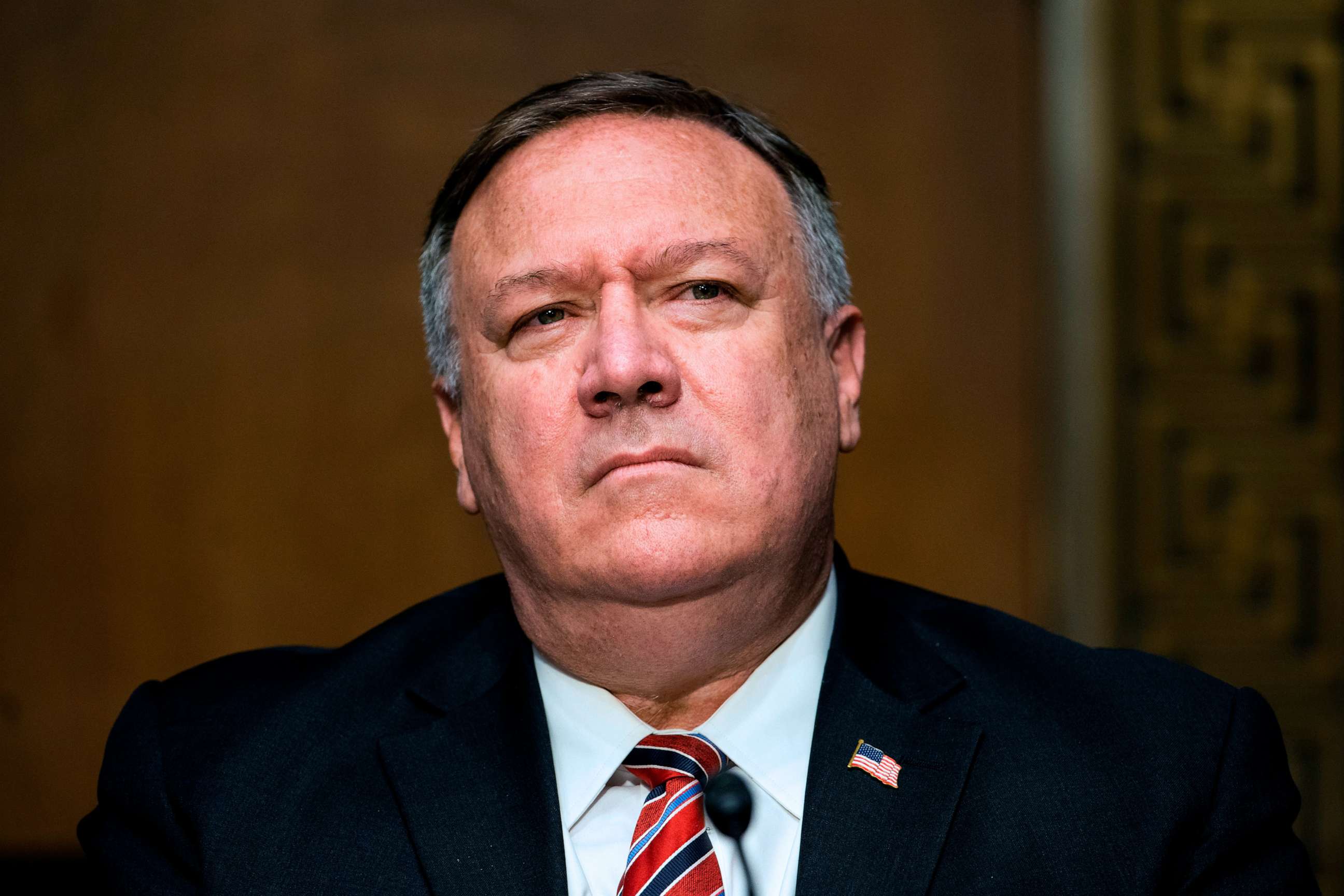 PHOTO: Secretary of State Michael Pompeo prepares to testify before a Senate Foreign Relations committee hearing on the State Departments 2021 budget in the Dirksen Senate Office Building in Washington, D.C., on July 30, 2020.
