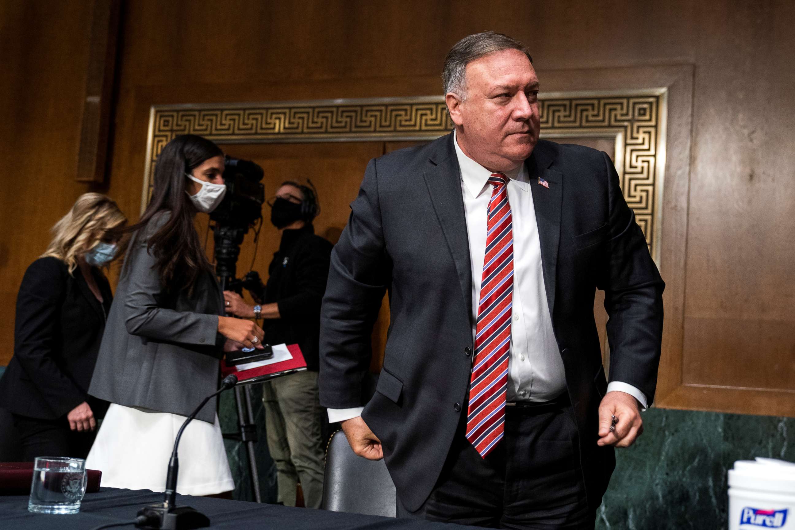 PHOTO: Secretary of State Mike Pompeo takes a break from testifying during a Senate Foreign Relations Committee hearing on the State Department's 2021 budget, in the Dirksen Senate Office Building, in Washington, July 30, 2020.