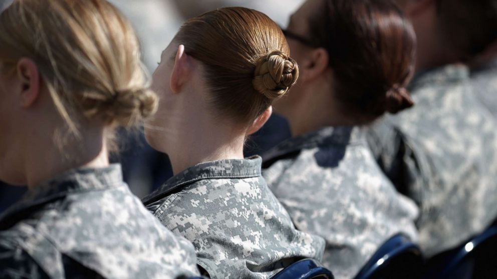 In this March 31, 2015 file photo, soldiers, officers and civilian employees attend the commencement ceremony for the U.S. Army's annual observance of Sexual Assault Awareness and Prevention Month in the Pentagon Center Courtyard, in Arlington, Va.