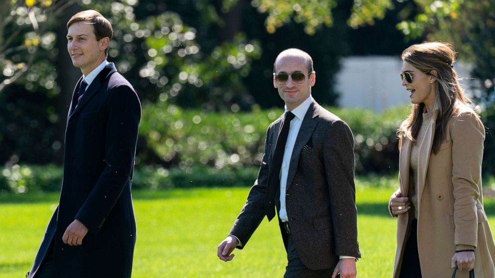 PHOTO: Senior Advisor to the President Jared Kushner, Senior Advisor to the President Stephen Miller, and counselor to President Hope Hicks walk to board Marine One with President Donald Trump at the White House, Sept. 30, 2020.