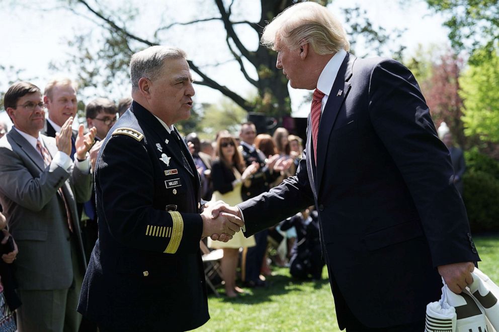 PHOTO: President Donald Trump shakes hands with U.S. Army Chief of Staff Mark Milley during a Rose Garden event, May 1, 2018, at the White House in Washington, DC. 