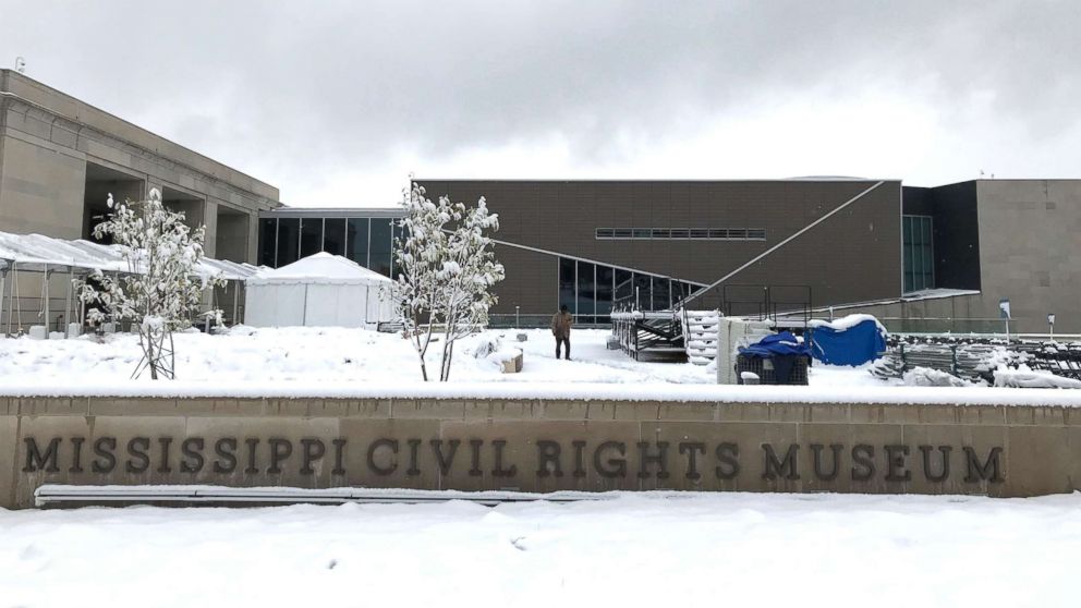PHOTO: Snow blankets the plaza of the Mississippi Civil Rights Museum in Jackson, Miss., as workers prepare the grounds for opening day ceremonies, Dec. 8, 2017.