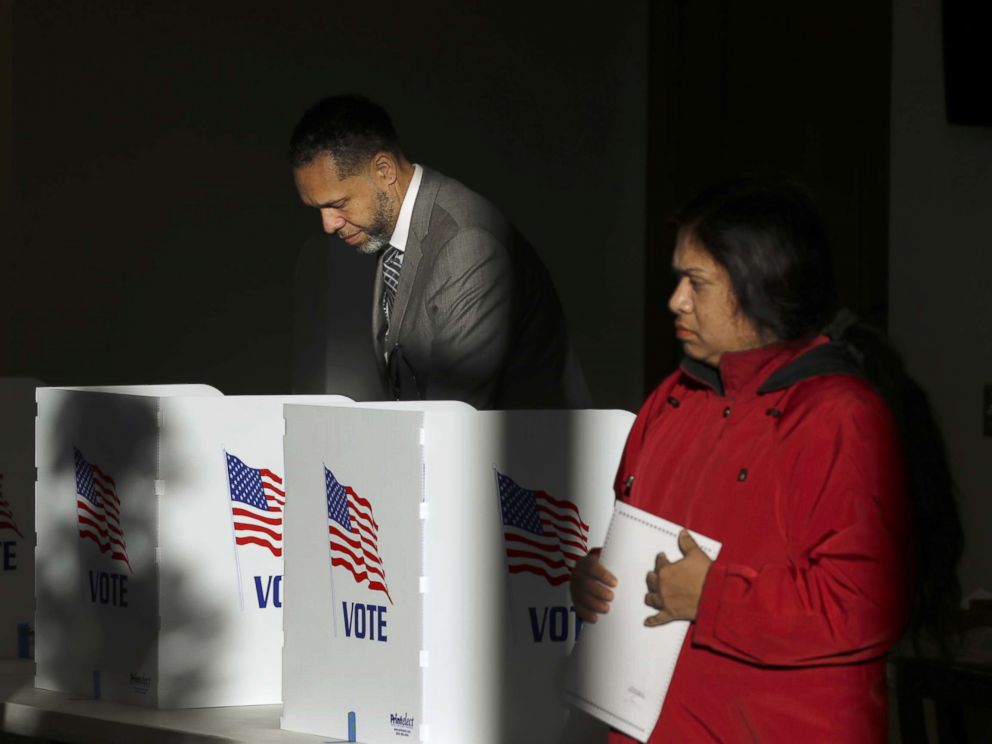 PHOTO: Voters cast their ballots at a polling place at Highland Colony Baptist Church, Nov. 27, 2018, in Ridgeland, Mississippi.