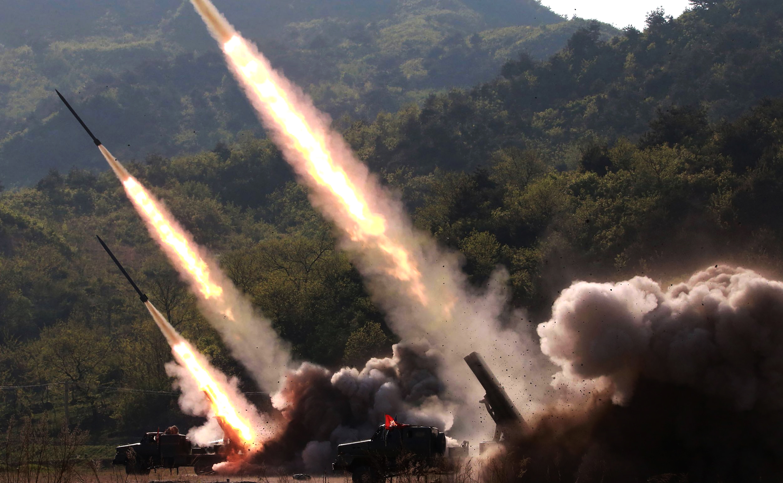 PHOTO: This May 9, 2019 picture released from North Korea's official Korean Central News Agency (KCNA) on May 10, 2019 shows rocket launchers firing during the strike drill in on the western front of North Korea.