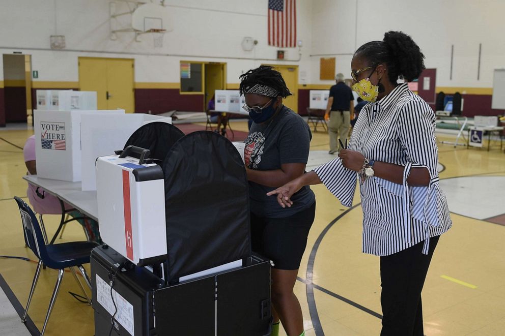 PHOTO: Voters cast their ballots at Keevan Elementary School, Aug. 4, 2020 in North St. Louis, Missouri.