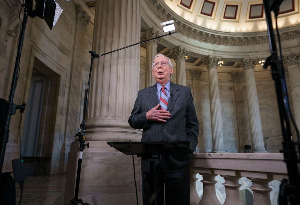 PHOTO: Senate Minority Leader Mitch McConnell, R-Ky., does a cable news interview before the start of a two-week recess, at the Capitol, June 23, 2021.
