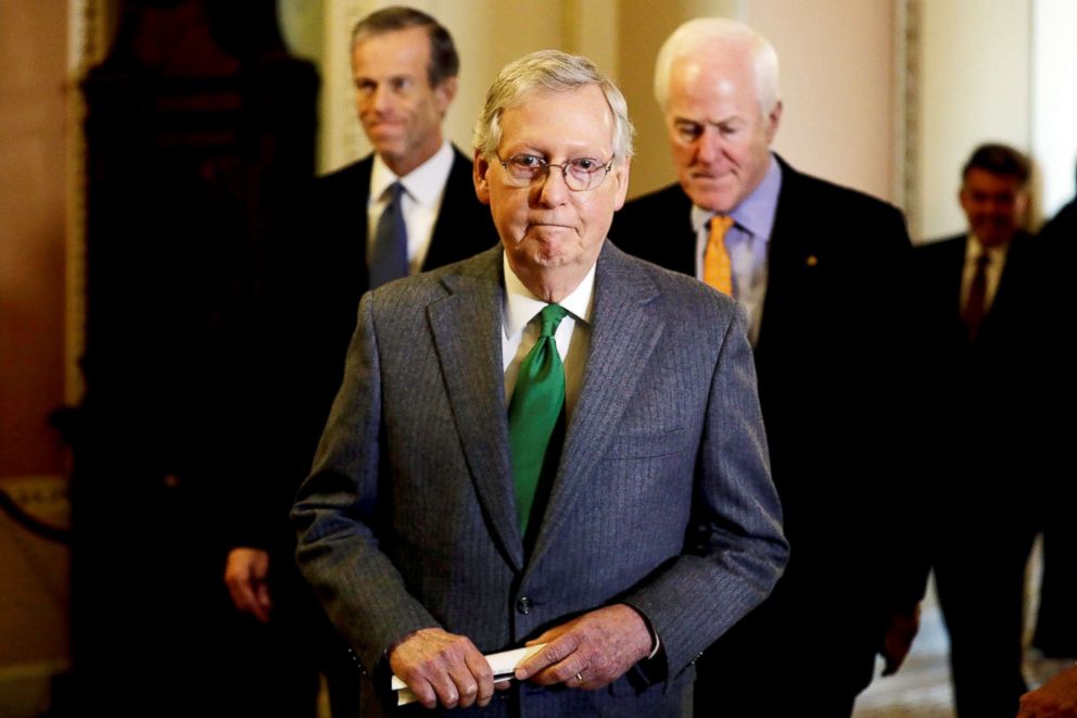 PHOTO: Senate Majority Leader Mitch McConnell (R-KY) arrives to talk to the media following the Republicans weekly policy luncheon on Capitol Hill, Dec. 12, 2017. 