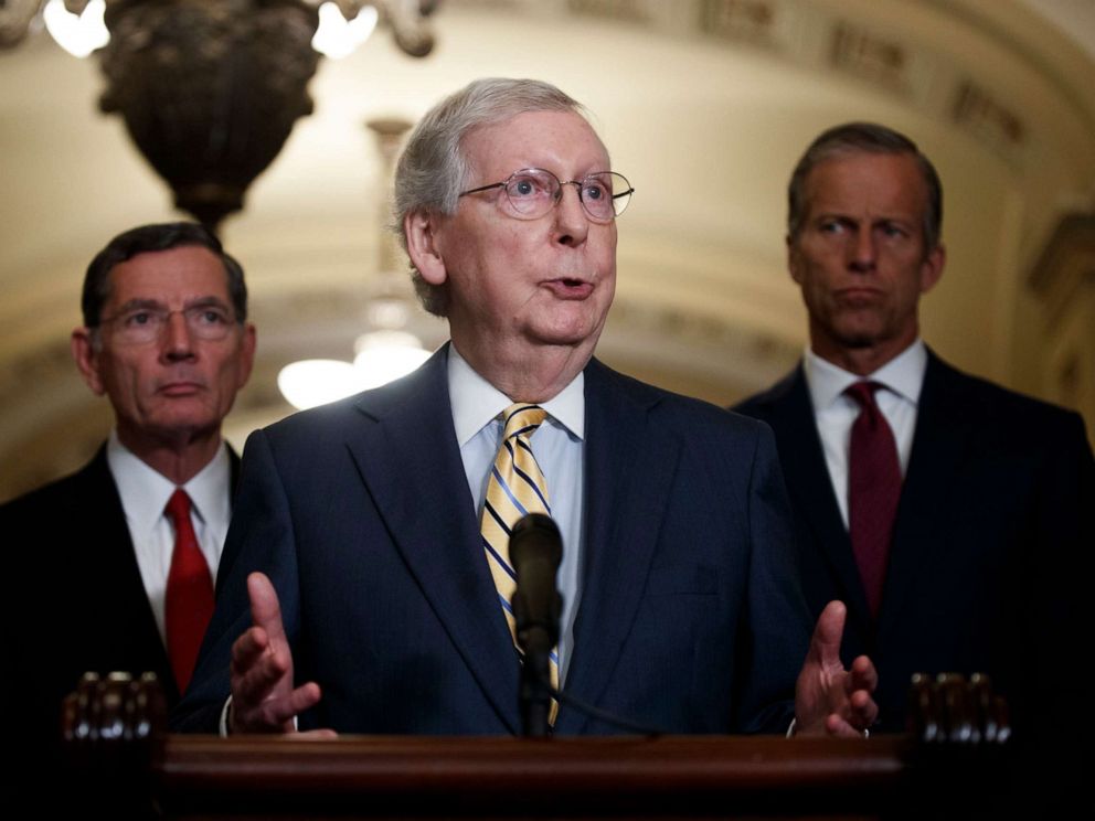 PHOTO: Senate Majority Leader Mitch McConnell responds to a question from the news media during a press conference in the Ohio Clock Corridor of the US Capitol in Washington, DC, July 9, 2019.