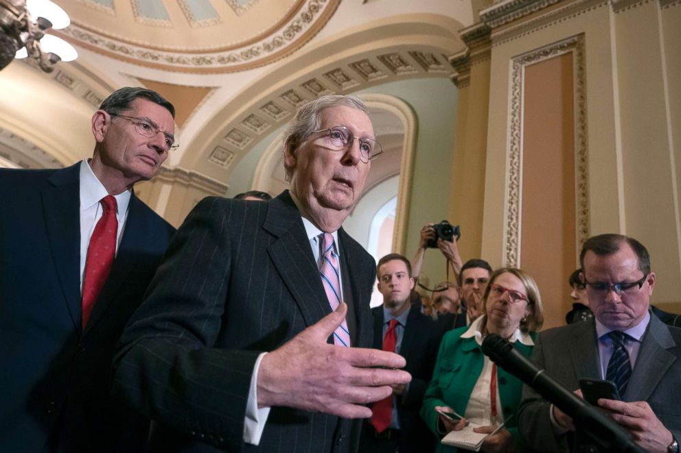 PHOTO: Senate Majority Leader Mitch McConnell, joined at left by Sen. John Barrasso, speaks to reporters following a closed-door GOP policy meeting at the Capitol in Washington, March 12, 2019.