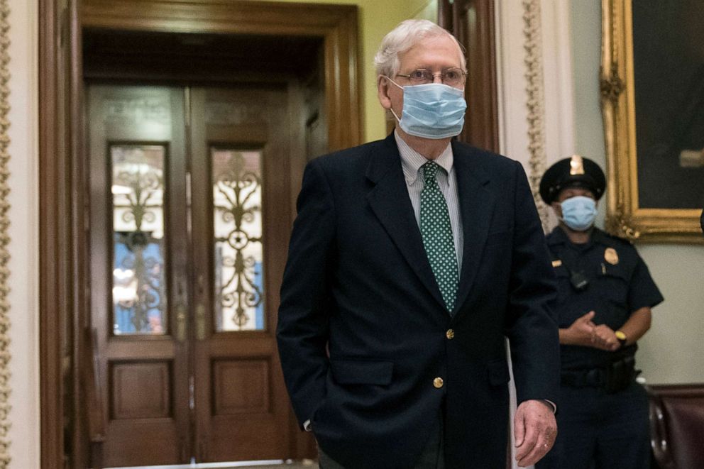 PHOTO: Senate Majority Leader Mitch McConnell leaves the chamber after a procedural vote to advance the confirmation of Amy Coney Barrett to the Supreme Court, at the Capitol in Washington, Oct. 25, 2020.