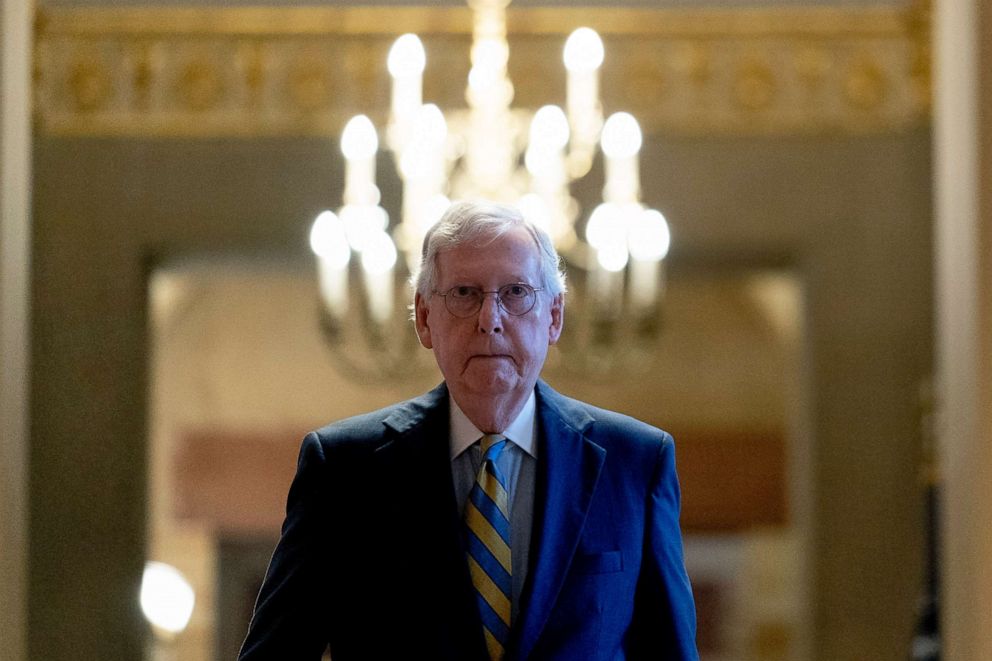 PHOTO: Senate Minority Leader Mitch McConnell of Ky., walks to the Senate Chamber at the Capitol Hill in Washington, Oct. 6, 2021, as a showdown looms with Democrats over raising the debt limit.