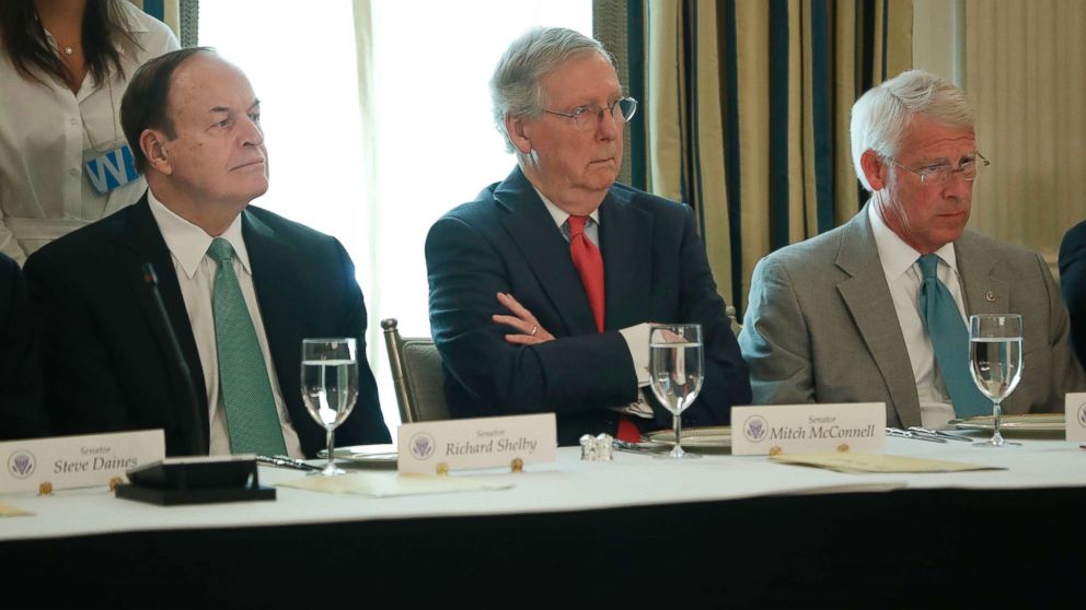 Sen. Richard Shelby, R-Ala., Senate Majority Leader Mitch McConnell of Ky., and Sen. Roger Wicker, R-Miss., listen as President Donald Trump speaks during a luncheon, July 19, 2017, at the White House. 