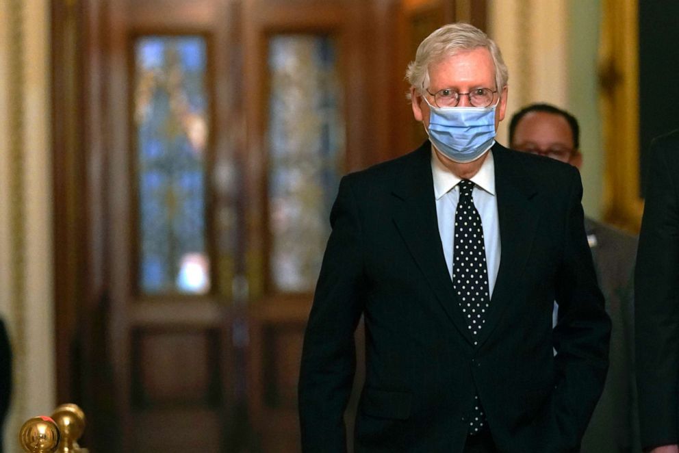 PHOTO: In this Jan. 6, 2021, photo, Senate Majority Leader Mitch McConnell walks from the Senate floor to his office on Capitol Hill in Washington, D.C.