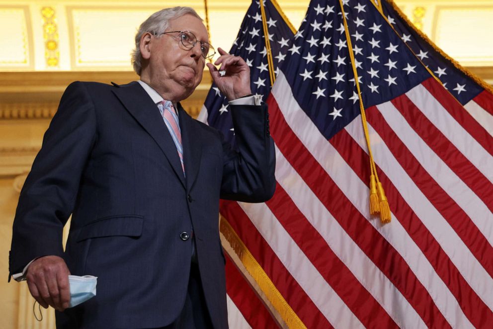 Senate Minority Leader Sen. Mitch McConnell, R-Ky., arrives at a news briefing after the weekly Senate Republican Policy Luncheon on Capitol Hill, April 27, 2021.