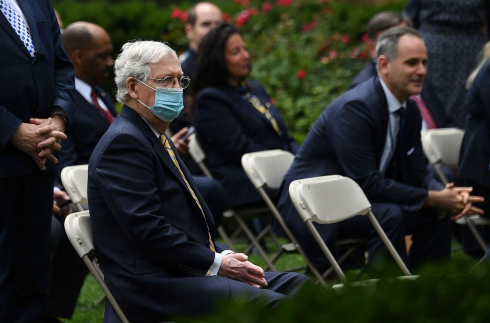 PHOTO: Mitch McConnell waits for President Donald Trump to sign an executive order on police reform in the Rose Garden of the White House, June 16, 2020.