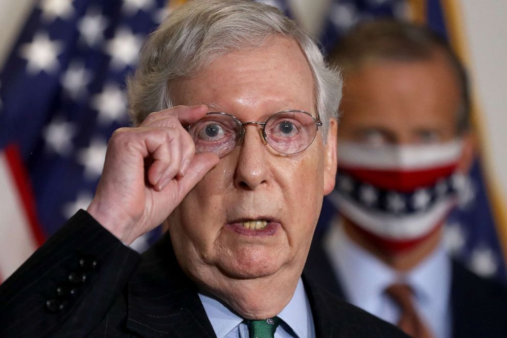 PHOTO: Senate Majority Leader Mitch McConnell talks to reporters following the weekly Senate Republican policy luncheon in the Hart Senate Office Building on Capitol Hill, Sept. 30, 2020, in Washington, DC.