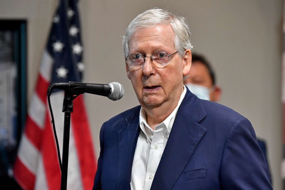 PHOTO: Senate Majority Leader Mitch McConnell, R-Ky., speaks with reporters during a visit to the Boundary Oak Distillery in Radcliff, Ky., Wednesday, Aug. 19, 2020.
