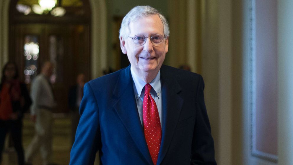 Senate Majority Leader Mitch McConnell walks from the U.S. Senate Chamber to his office after a procedural vote to move forward with voting on the Republican proposed tax reform bill at the Capitol in Washington, D.C., Dec. 1, 2017. 