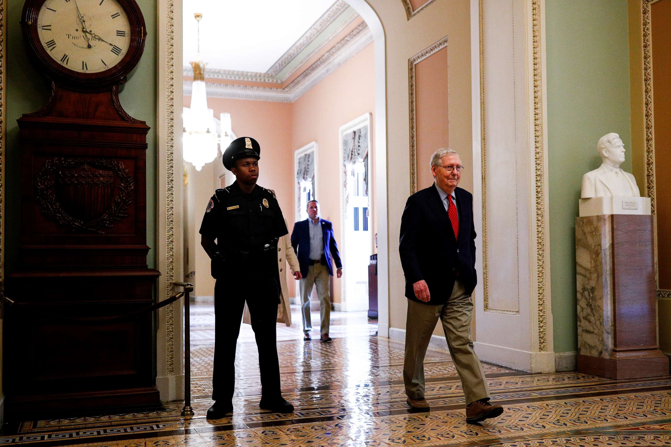 PHOTO: Senate Majority Leader Mitch McConnell walks through the Ohio clock corridor after it was announced that congressional leaders and the White House agreed on nearly $500 billion more in coronavirus relief, in Washington, April 21, 2020.