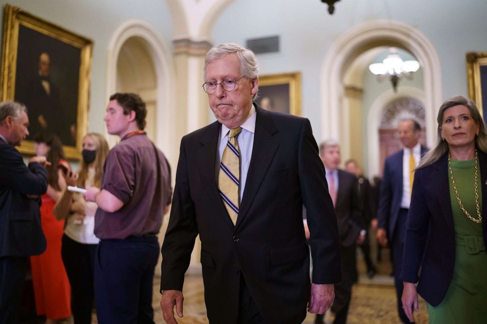PHOTO: Senate Minority Leader Mitch McConnell, R-Ky., joined at right by Sen. Joni Ernst, R-Iowa, arrives to meet with reporters following a weekly strategy luncheon, at the Capitol in Washington, Tuesday, July 20, 2021.