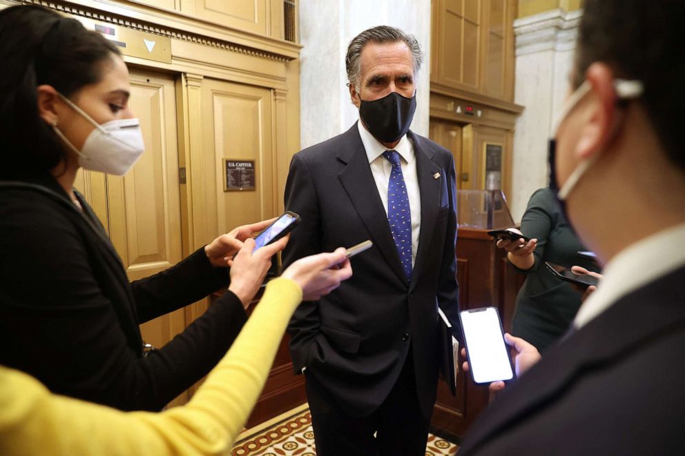 PHOTO: Sen. Mitt Romney speaks to members of the media while departing the Capitol, Feb. 9, 2021.