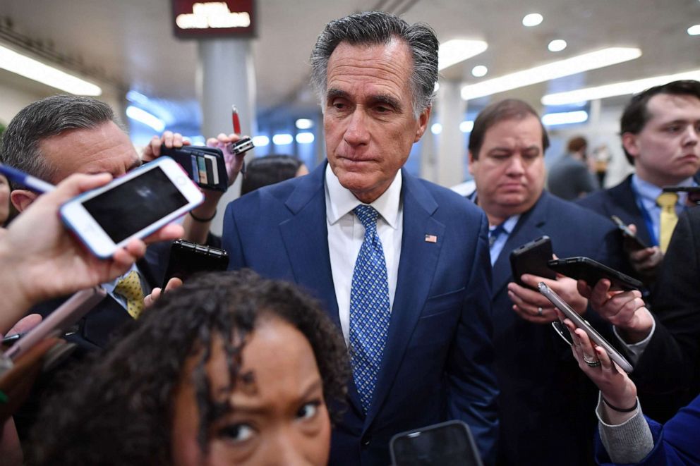 PHOTO: Senator Mitt Romney speaks to the media as he arrives during the impeachment trial of President Donald Trump on Capitol Hill, Jan. 29, 2020, in Washington, DC.