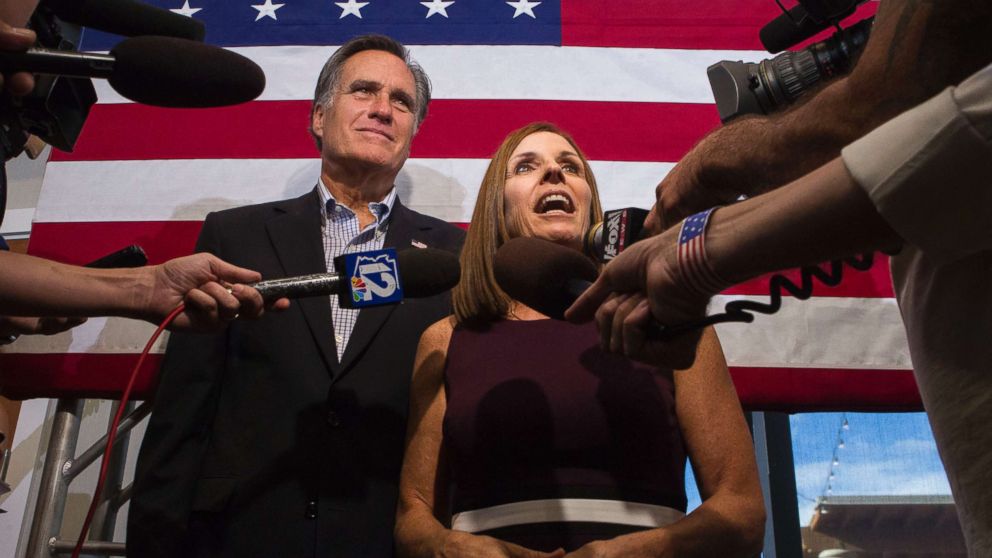 PHOTO: Rep. Martha McSally along with former Republican presidential nominee Mitt Romney, right, answers questions from the media during a Get Out the Vote Rally at the Gilbert Falls Event Center in Gilbert, Ariz., Oct. 12, 2018.