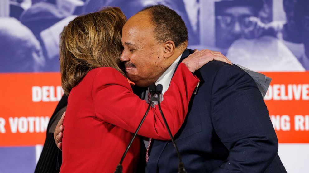 PHOTO: Martin Luther King III and Speaker of the House Nancy Pelosi embrace during a press conference at Union Station on Martin Luther King Jr. Day, Jan. 17, 2022, in Washington, D.C.