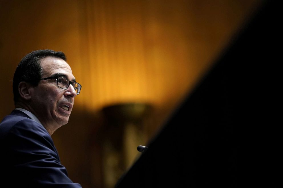 PHOTO: Treasury Secretary Steven Mnuchin testifies during a Senate's Committee on Banking, Housing, and Urban Affairs hearing examining the quarterly CARES Act report to Congress, in Washington, DC, Sept. 24, 2020.