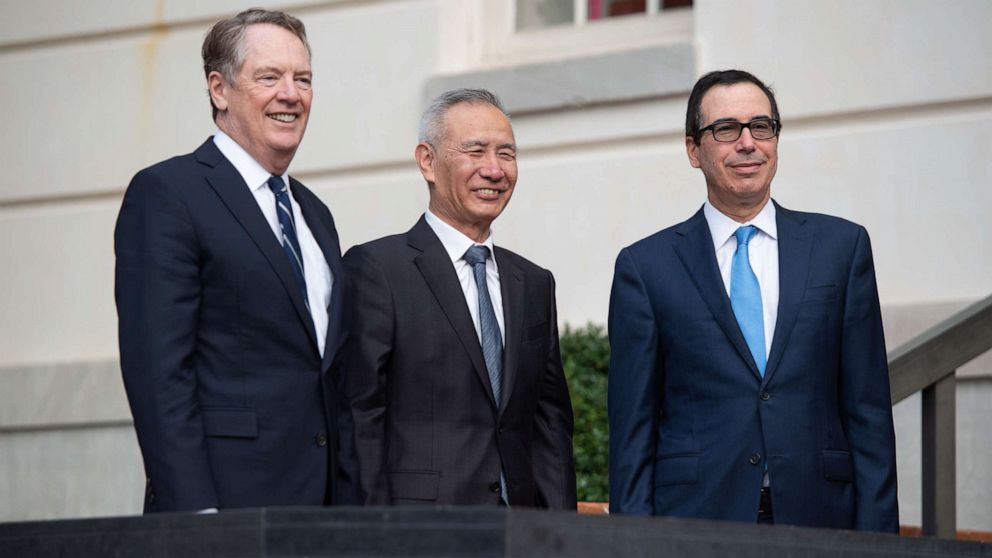 PHOTO: Treasury Secretary Steven Mnuchin (R) and Trade Representative Robert Lighthizer (L) greet Chinese Vice Premier Liu He as he arrives for trade talks at the Office of the U.S. Trade Representative in Washington, D.C., Oct. 10, 2019.
