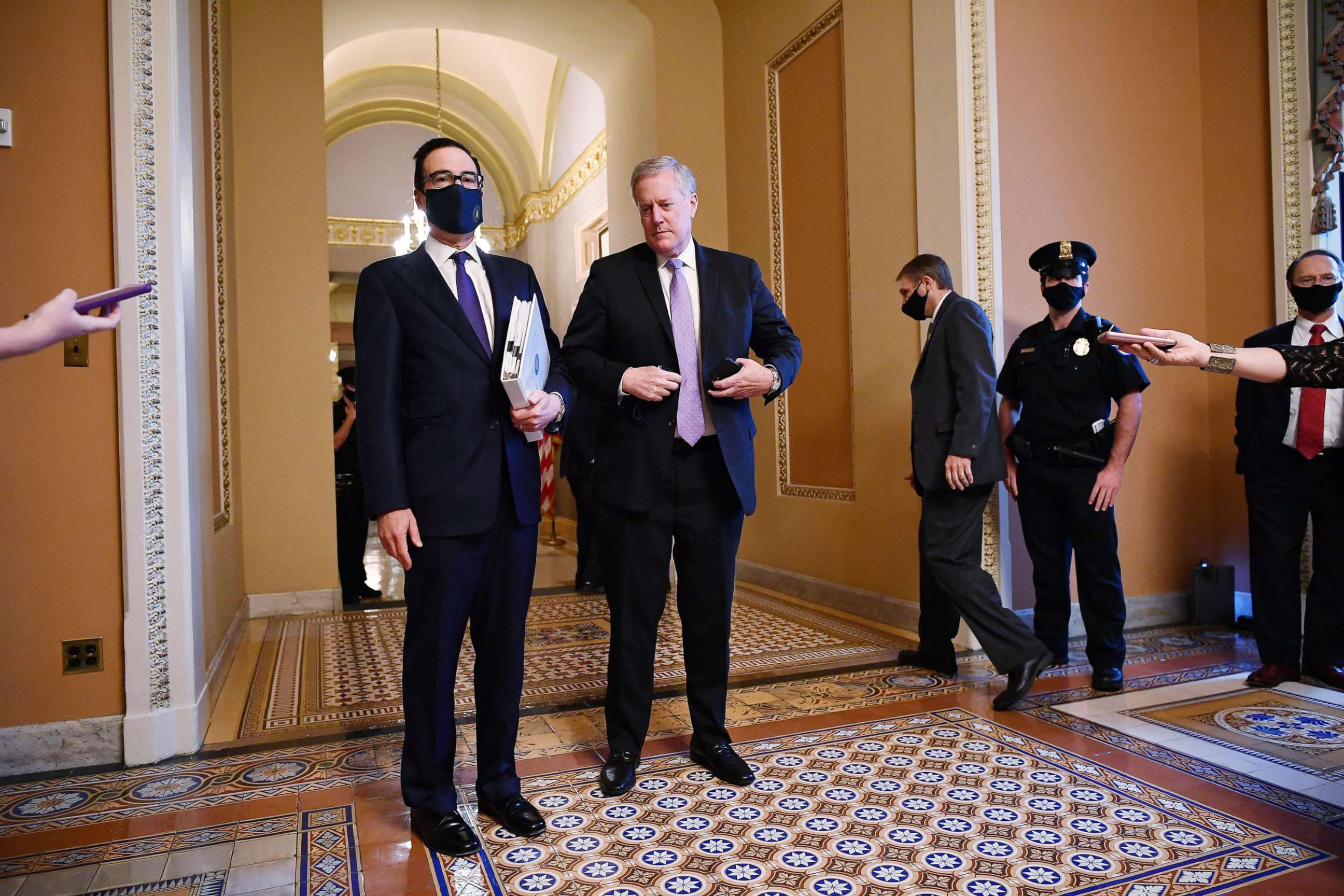 PHOTO: Treasury Secretary Steven Mnuchin and White House Chief of Staff Mark Meadows speak to reporters at the Capitol, Aug. 3, 2020, in Washington, D.C.