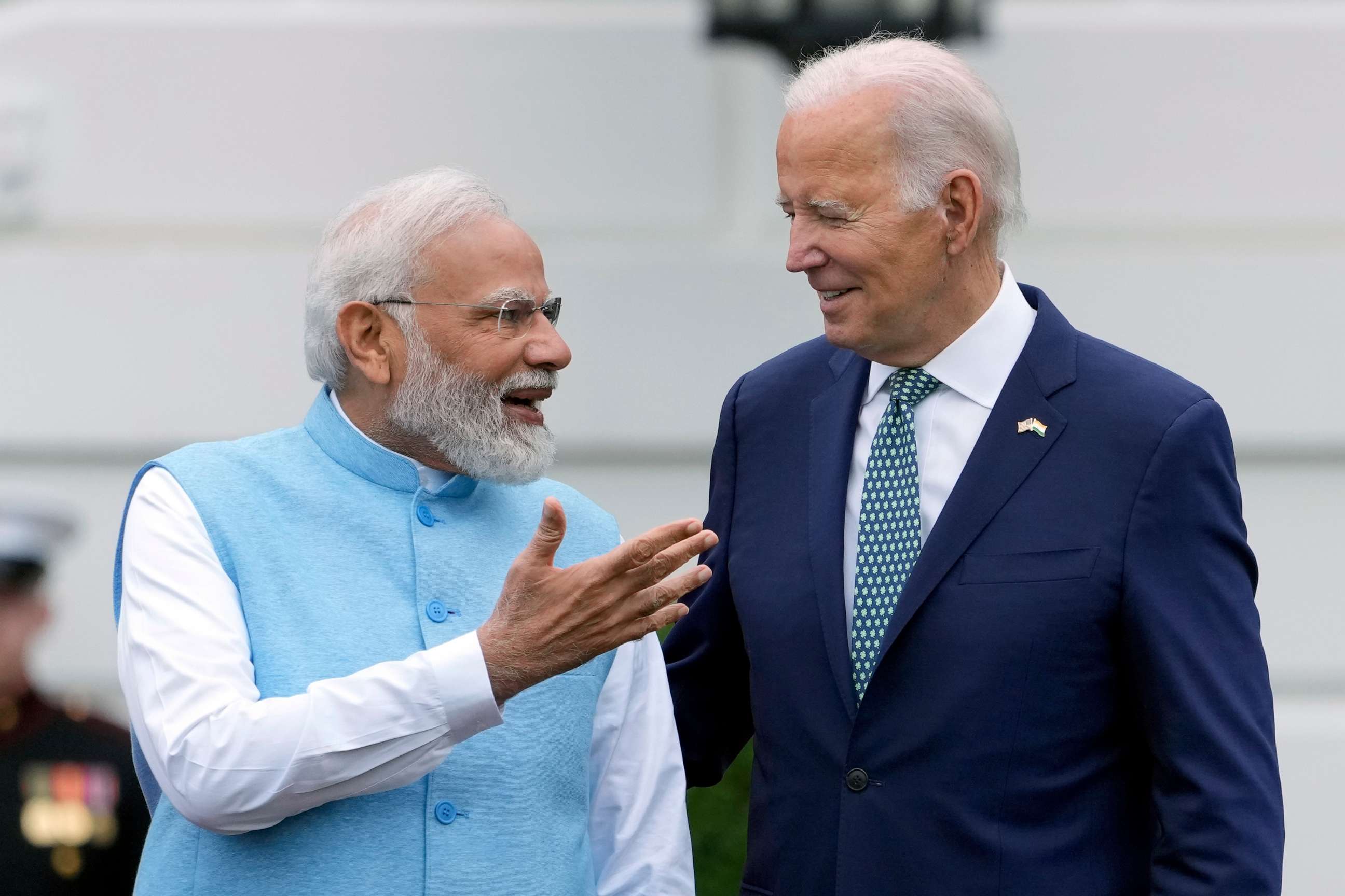 PHOTO: India's Prime Minister Narendra Modi speaks with President Joe Biden during a State Arrival Ceremony on the South Lawn of the White House, June 22, 2023, in Washington.