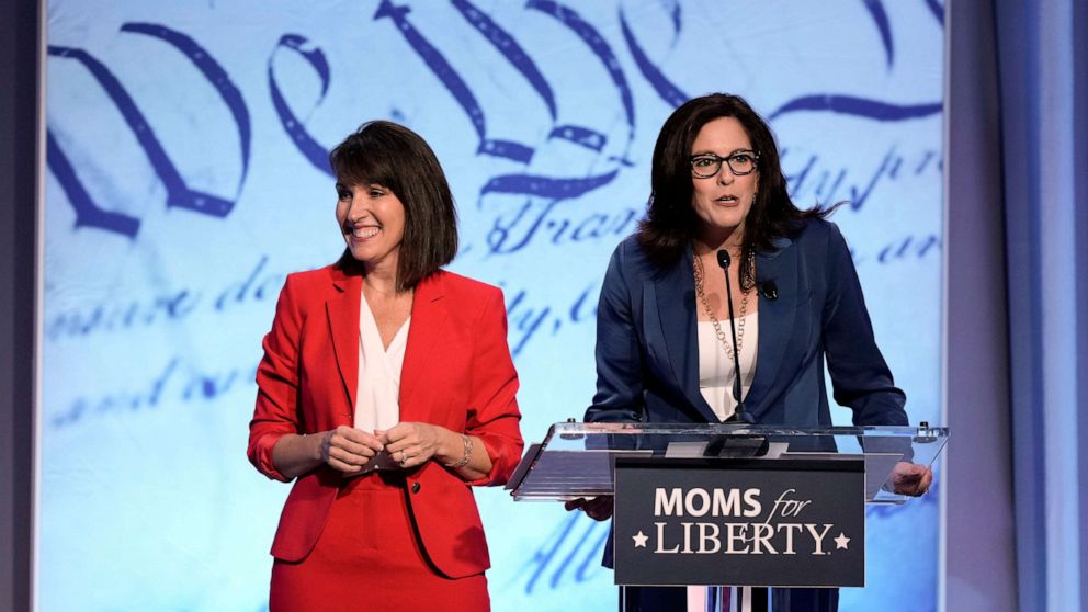 PHOTO: Moms for Liberty founders Tiffany Justice, right, and Tina Descovich speak at the Moms for Liberty meeting in Philadelphia, on June 30, 2023.