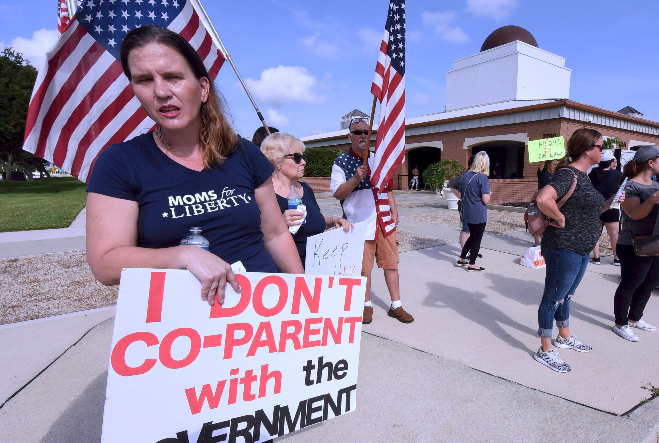 PHOTO: A member of Moms for Liberty protests against mandatory face masks for students during the COVID-19 pandemic at a meeting of the Brevard County School Board in Viera, Florida.