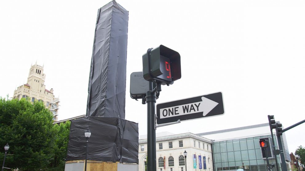 PHOTO: The Asheville, N.C., city council voted to shroud and remove a granite obelisk monument to former governor, Confederate leader and slave owner Zebulon Vance. The site has become a gathering point for racial justice protests.